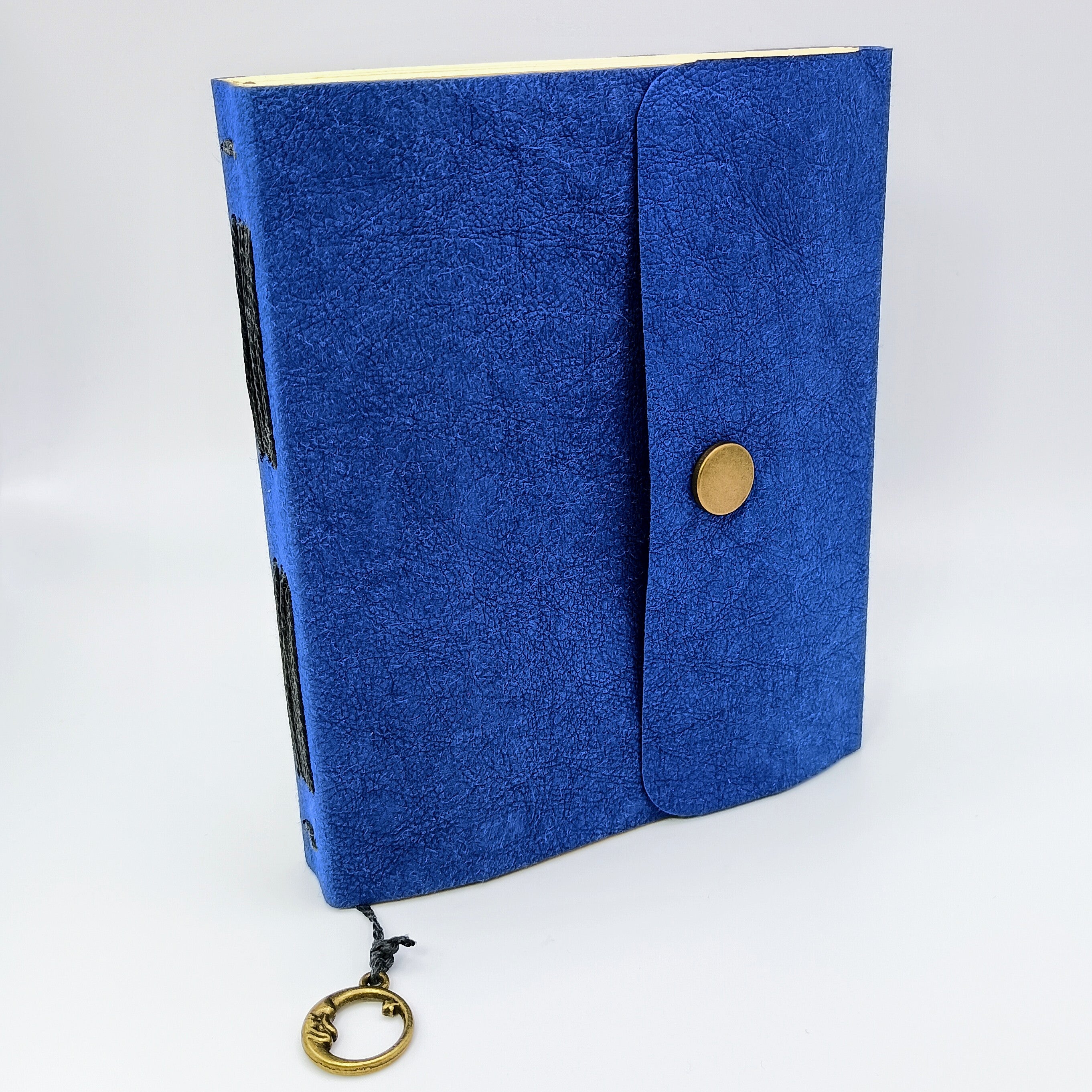 Blue kraft-tex tree leather dream journal with moon charm