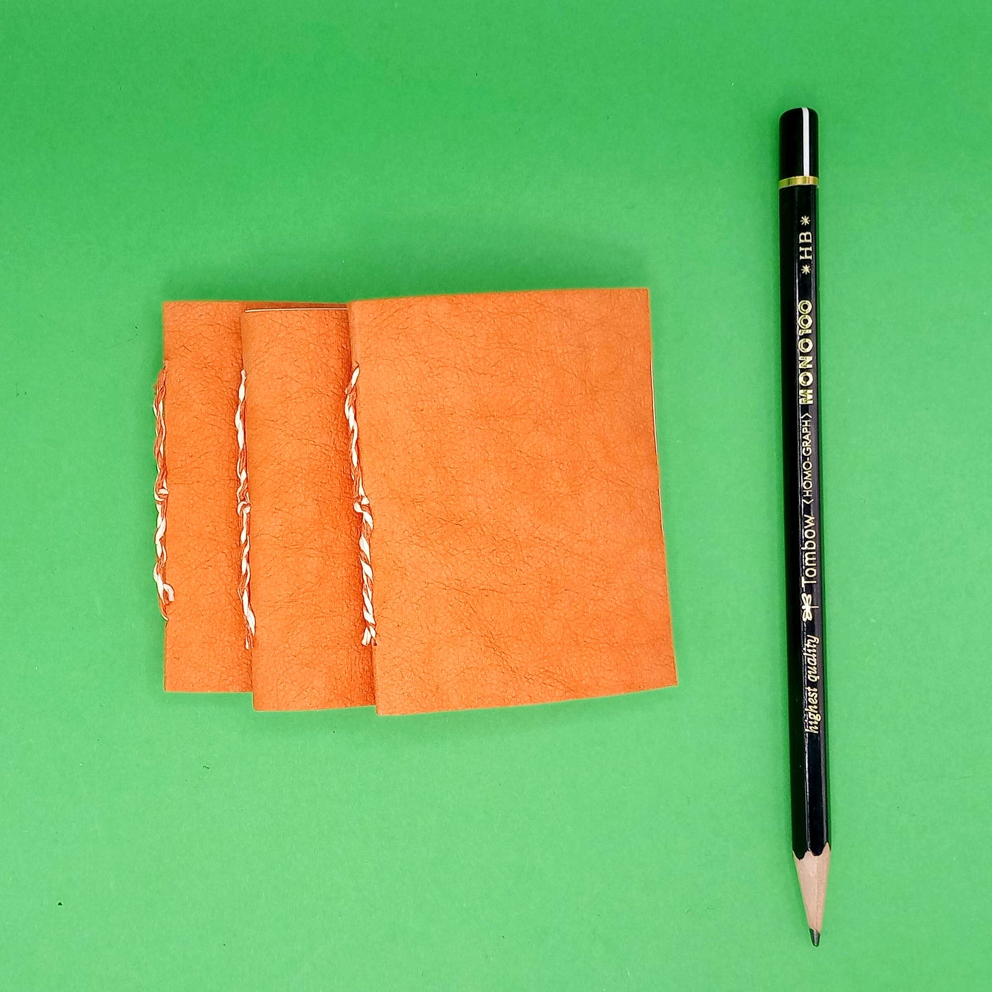 Tiny Orange Notebooks